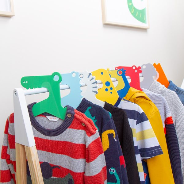 Boys set of clothes hangers in a rack