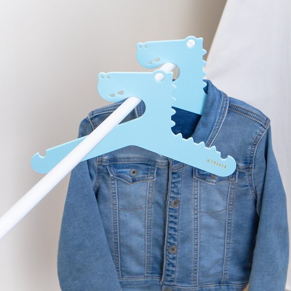 designer Kids hanger dinosaur shaped on a rack