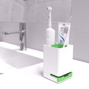 Small anti mould bathroom toothbrush caddy in use