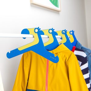 cute blue toucan shaped designer Kids hanger on a rack