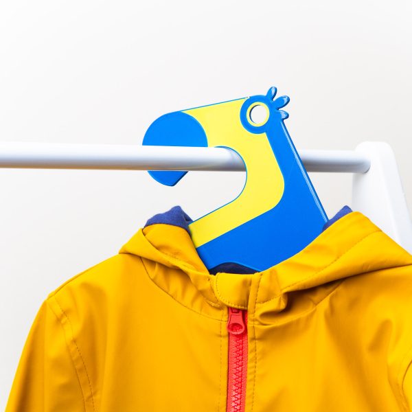 cute blue toucan shaped designer Kids hanger on a rack